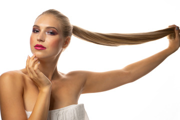 Naklejka premium Young seductive blonde woman with stylish make-up