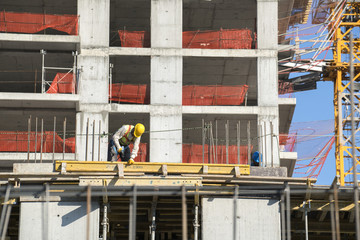Naklejka premium Construction site workers at Construction site
