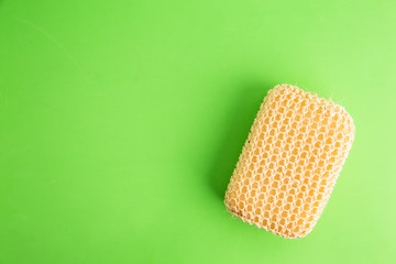 sponge with esparto to exfoliate in bathroom