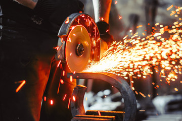 Working saws iron sparks