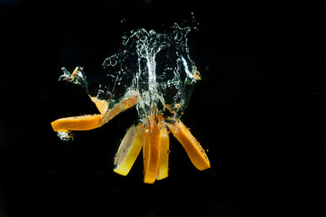 Orange and lemon underwater