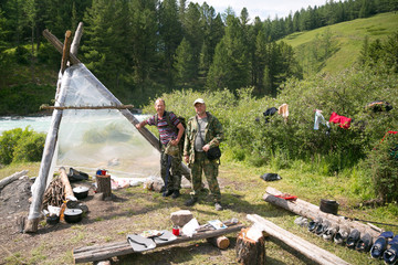 Awesome weatherproof shelter. The hut wigwam shelter for tourists in a hike in the wild. © ALEXEY