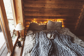 Fototapeta na wymiar Cozy winter weekend in log cabin
