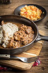 Barley groats with stewed meat.