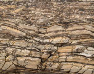 Brown stone background with horizontal layers and pattern