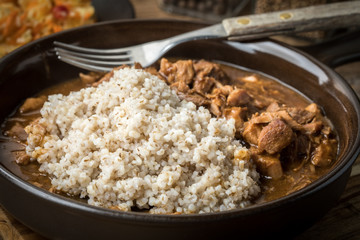 Barley groats with stewed meat.