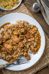 Barley groats with stewed meat.