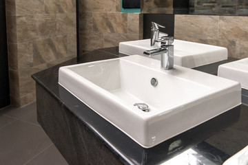 Beautiful Bathroom interior with sink and faucet