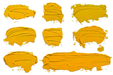 Set of eight textured yellow oil paint brush stroke, convex with shadows, isolated on white...