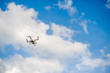 Aerial photography equipment Flying in the blue sky. And copy space