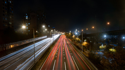 Fototapeta na wymiar Traffic trail in city at night