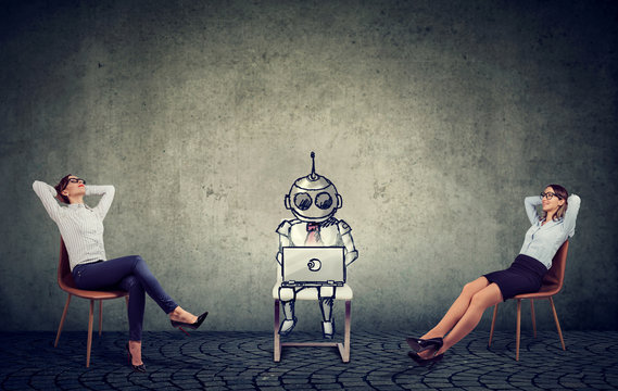 Two businesswomen relaxing enjoying artificial intelligence assistance in company management 