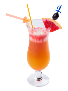 tequila sunrise cocktail in a tall glass. decorated with slice of orange and black olive