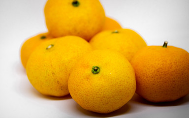 Orange is a fruit that can be eaten with anything delicious, orange on a white background, orange meat, milk, orange juice.