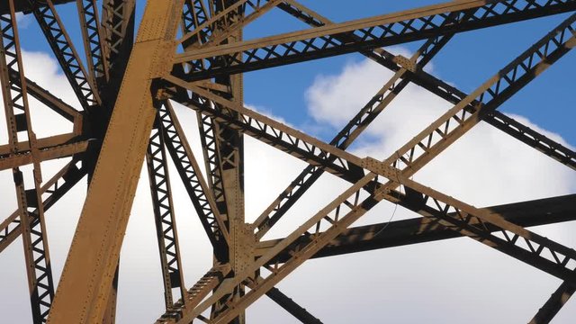 Detail of rusty steel iron trestle train bridge. Winter in Toronto, Canada.