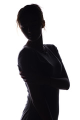 silhouette of figure of beautiful girl, woman face on white isolated background, concept of beauty and fashion
