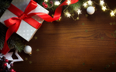art Christmas Gift With Ornament On Table ; Christmas greeting card background