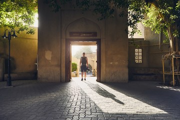 Silhouette of young tourist