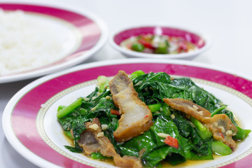 Stir-fried kale vegetable with crispy pork