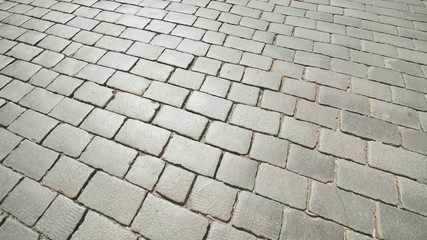 The road is made of stone bricks. Video in motion.