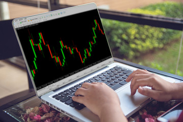 Forex concept : Business people working with stock trading forex on laptop