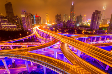 Fototapeta premium Traffic tracks in the downtown area of Shanghai at night