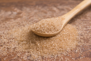 Pile of demerara sugar in a spoon