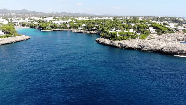 Flight over the bay of Cala D'or, village Cala D'or, Felanix and Porto Pedro region, Cala Ferrera, Mallorca