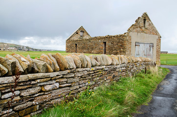 Stone Wall Leading to Old Barn Missing Roof