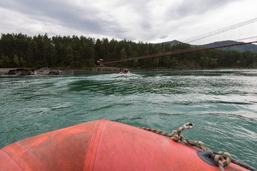 Rafting and boating on the Katun River in the Altai in Russia. First-person view.