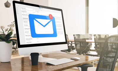 computer receiving mail on modern business office mockup