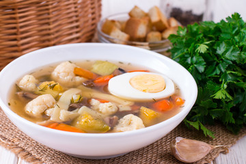 Vegetable soup with cabbage, beans, chicken, egg