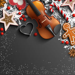 Christmas background with violin, ornaments and snowflakes