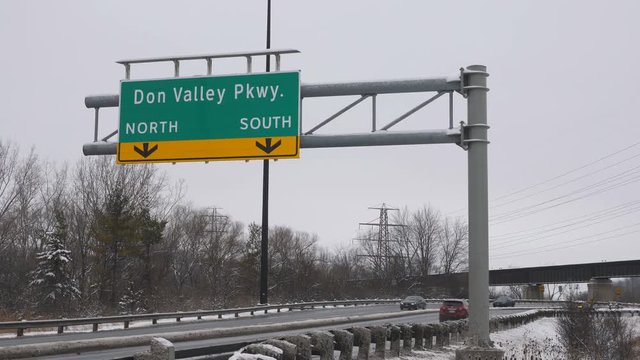 Signs for the Don Valley parkway. Winter in Toronto, Canada