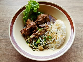 duck noodle in bowl