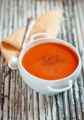 Tomato soup gazpacho with black and white pepper,shallow depth of field