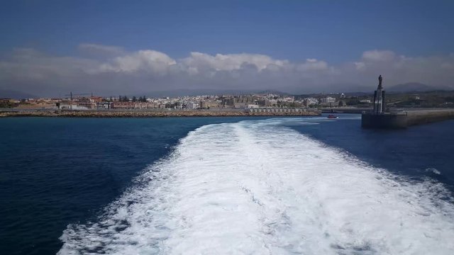 Ferry leaves Tarifa harbor in Spain
