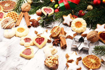 Baking christmas cookies. Typical cinnamon stars bakery for xmas with ingredients.