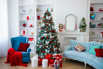 Festive room with christmas tree and gifts
