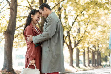 Joyful handsome brunette man enjoying pleasant communication