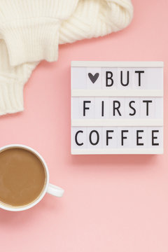 But first coffee text on lightbox with Coffee Cup