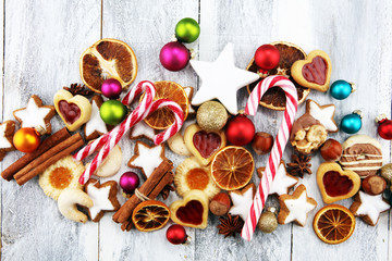 Decoration with christmas cookies. Typical cinnamon stars with fruits and nuts