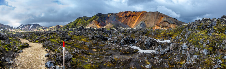 Hiking trail and a marker in beautiful colorful volcanic mountains Landmannalaugar in Iceland