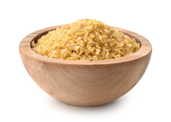 Wooden bowl full of bulgur
