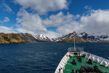 The bow of the ship Ushuaia heads toward Stromness Island in the South Georgia group