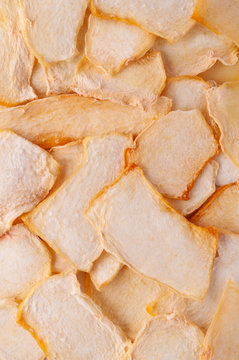 Dried melon slices (chips) background.