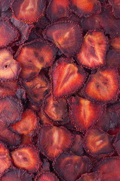 Dried strawberry slices (chips) background.