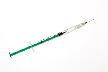 Fototapeta premium A lot of transparent medical syringes. Close up shot, white background.