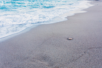 Blue waves in the sand