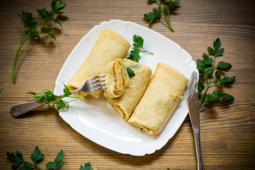 thin fried pancakes stuffed with stewed cabbage